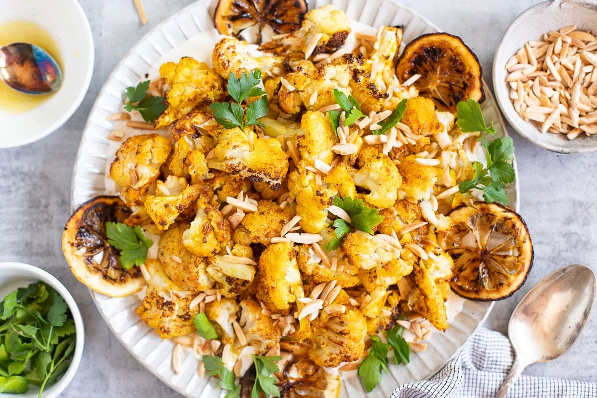 Roasted Cauliflower With Lemon Tahini Sauce and toasted almonds.