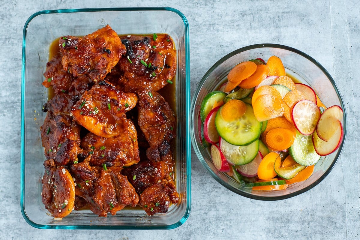 baked chicken thighs with gochujang in meal prep containers
