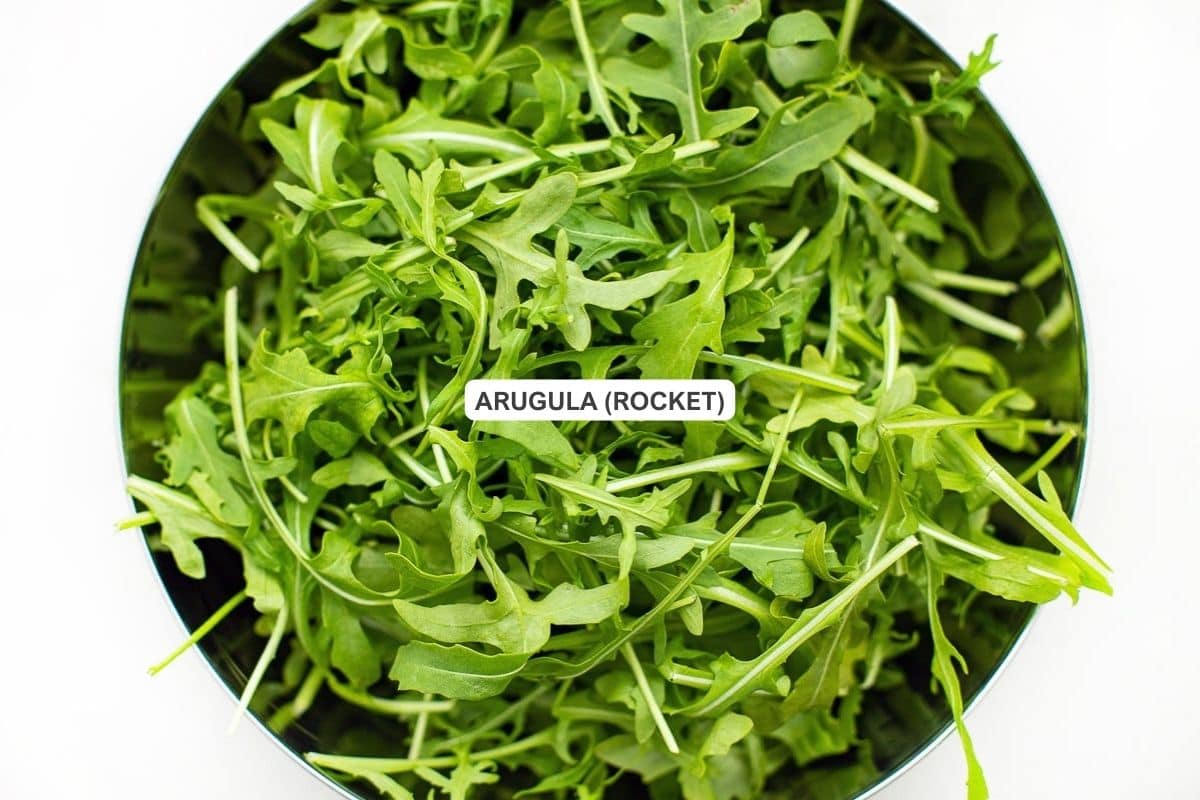 Ingredients for the recipe including arugula.