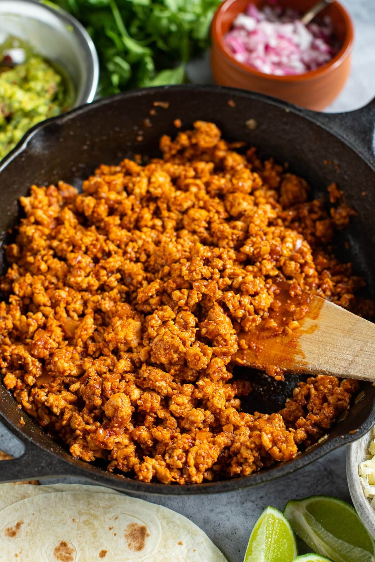 BBQ ground chicken in a skillet.