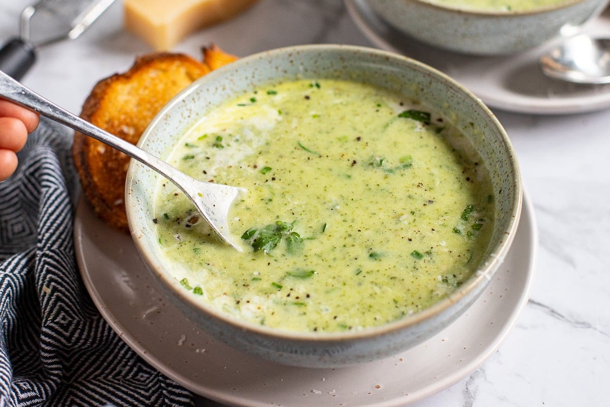soup with watercress in a bowl.