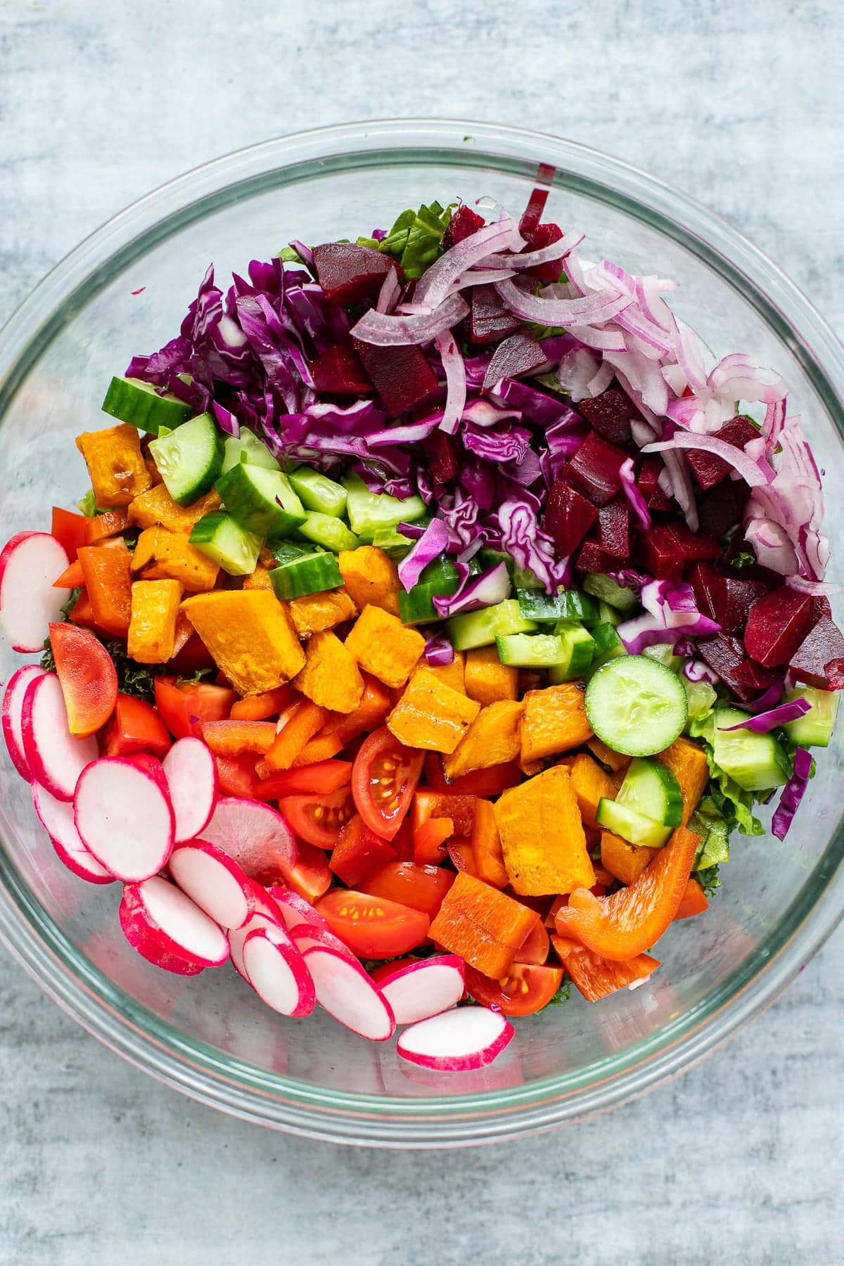 Superfood salad with nutritious ingredients like kale, butternut squash, beets and pumpkin seeds.