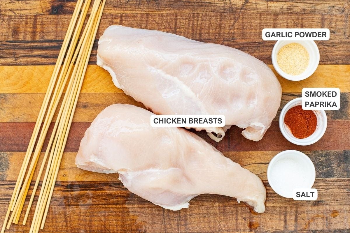 Ingredients for the recipe including chicken breasts, garlic powder, smoked paprika, and salt.