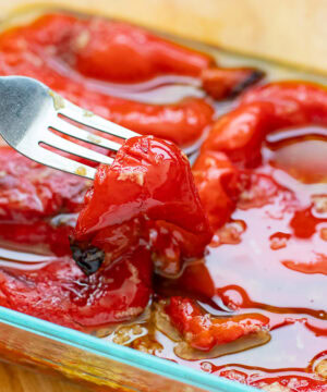 Roasted Red Peppers tossed in tangy garlic-infused olive oil