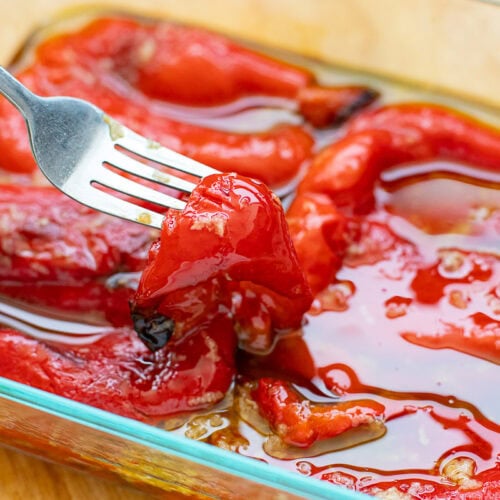 Roasted Red Peppers tossed in tangy garlic-infused olive oil