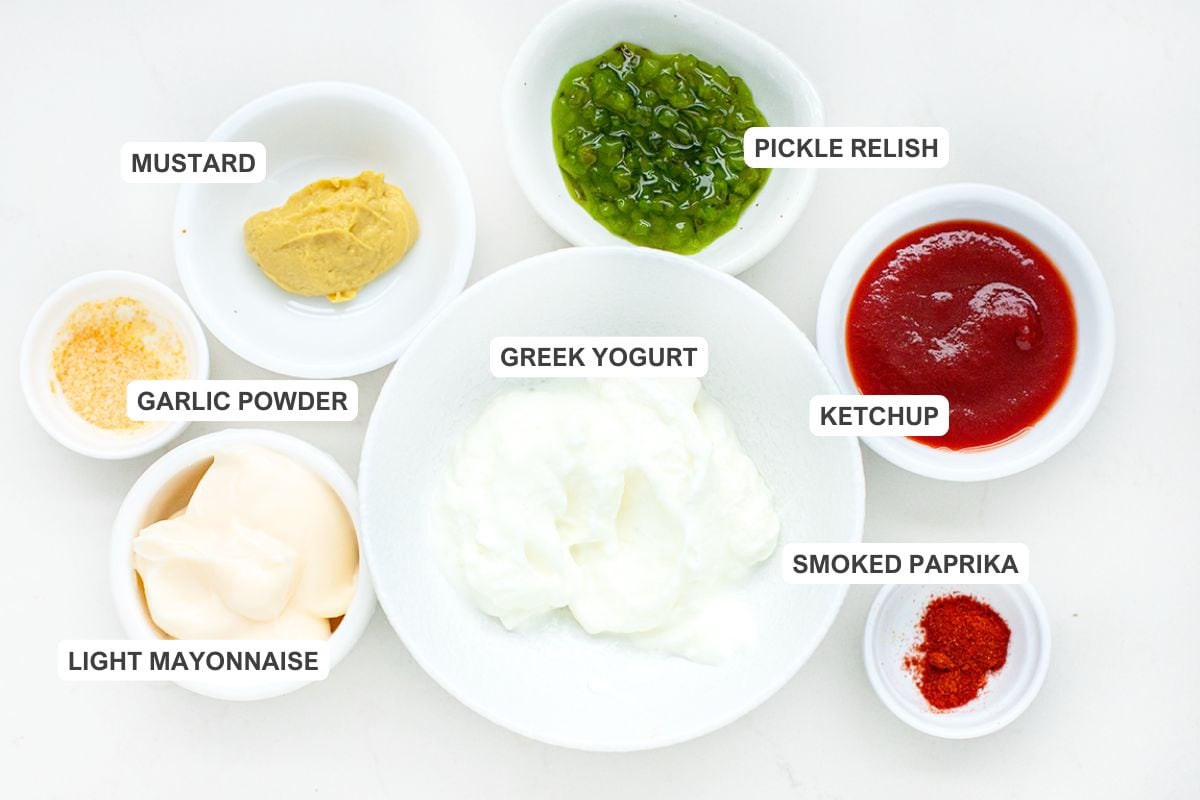 Ingredients for the recipe including greek yogurt, smoked paprika, ketchup, pickle relish, mustard, garlic powder, and light mayonnaise.