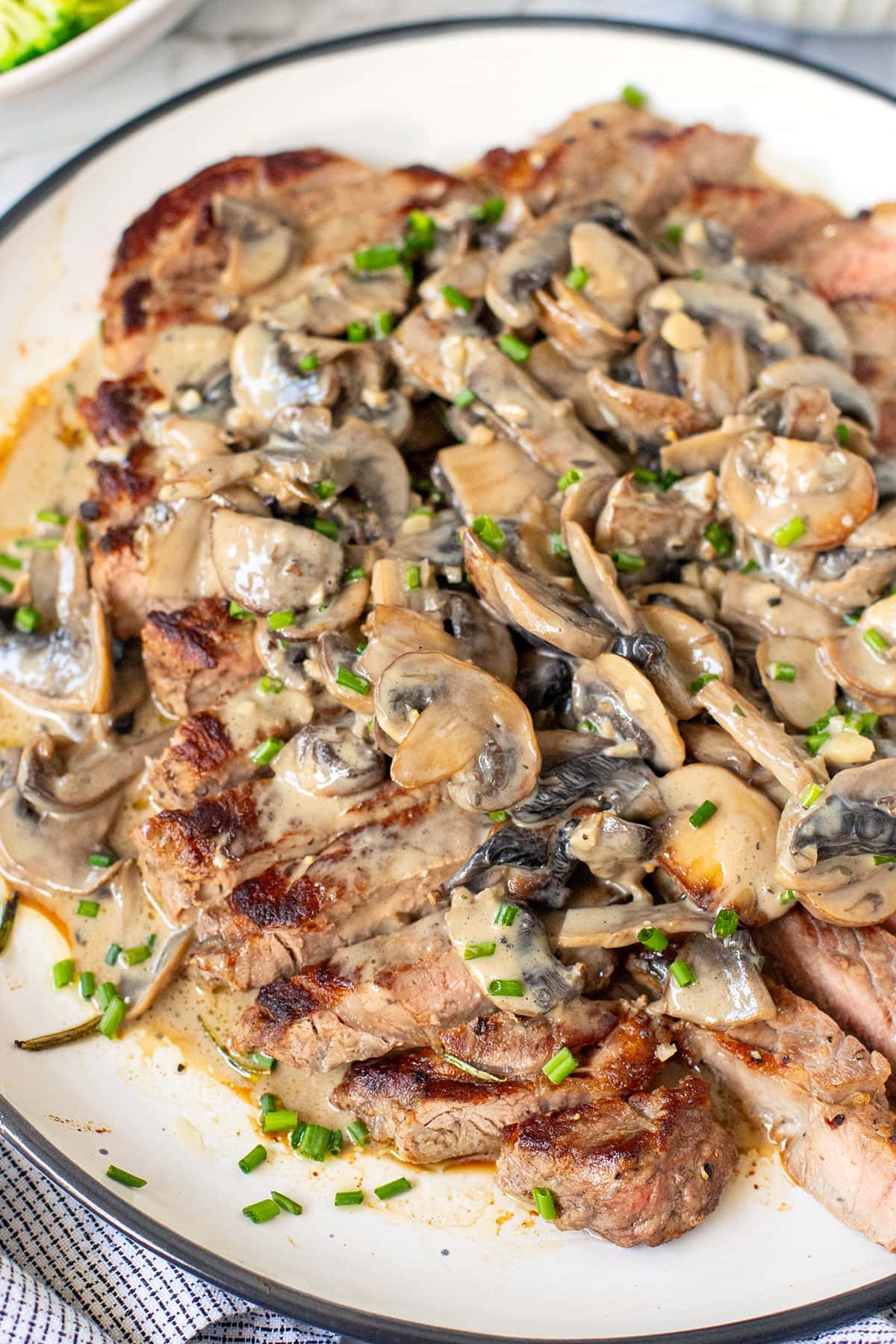 sliced steak and mushroom sauce.
