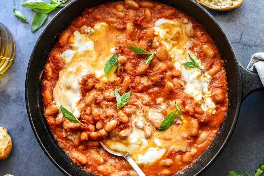 Beans in Tomato Sauce with Melted Ricotta